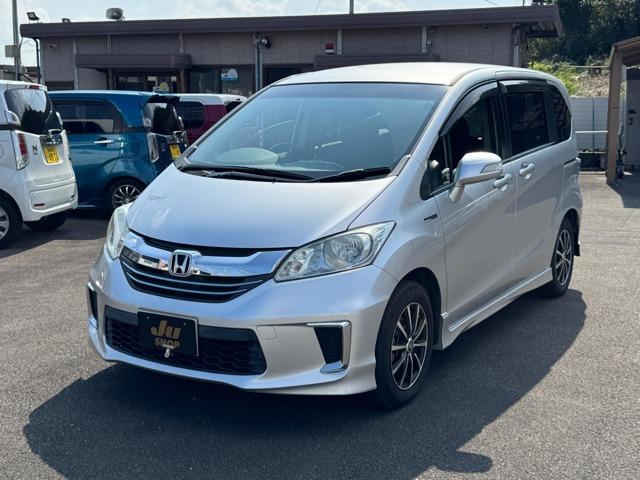 ホンダ フリードハイブリッド 1.5 ジャストセレクション 7人乗り/ナビ/TV・Bカメラ/両側電動写真1枚目 ホンダ フリードハイブリッド 1.5 ジャストセレクション 7人乗り/ナビ/TV・Bカメラ/両側電動写真1枚目